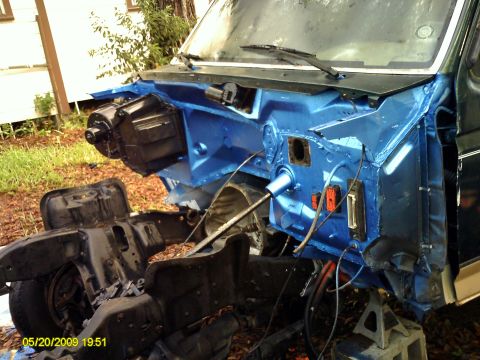 1992 Ford Bronco - Firewall and chassis of a vehicle undergoing restoration, with visible date stamp.