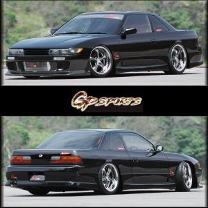 1999 Ford Taurus - This black coupe is shown from the front and rear, highlighting its modified appearance.