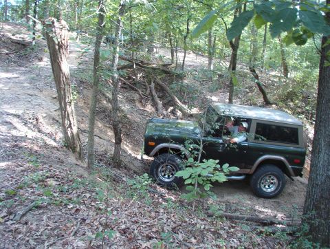 1975 Ford Bronco - It's too sharp a turn to go up the sled trail (in the background to his R), so he drove up onto the ridge. I backed up this hill after comi…