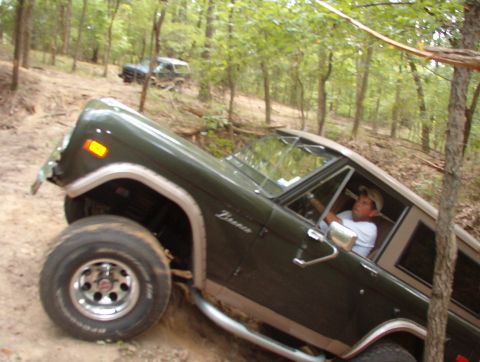 1975 Ford Bronco - After confirming (AGAIN) that his bumpers weren't in danger, he drove up onto the ridge (at HIGH pucker).