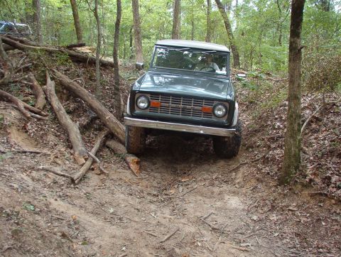 1975 Ford Bronco - The log pile is just enough to require a little attention.