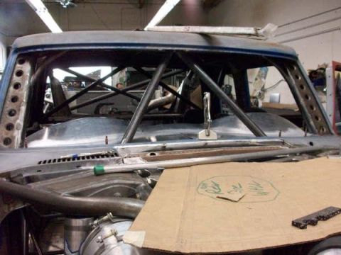 1986 Ford Bronco - This modified 1978 Ford Bronco features extensive roll cage reinforcement and a partially disassembled interior.