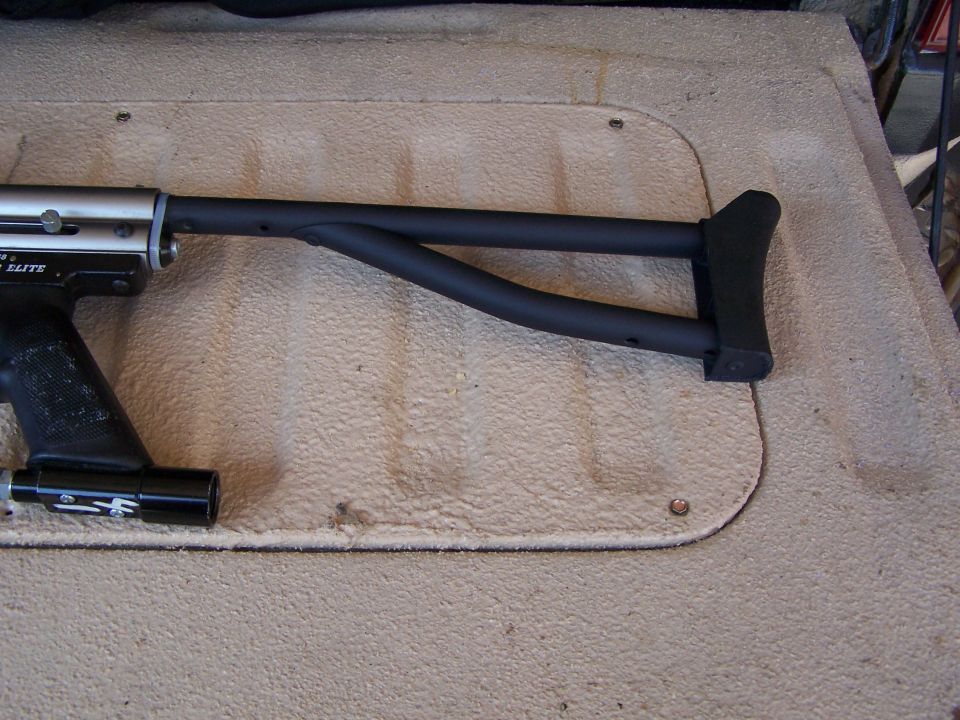 Paintball gun stock attached to a silver body with a black grip