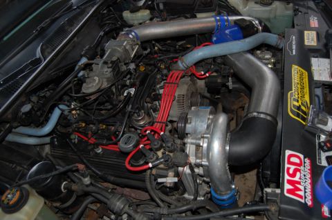 1985 Mercury Grand Marquis - Custom engine bay a supercharger and performance ignition components.