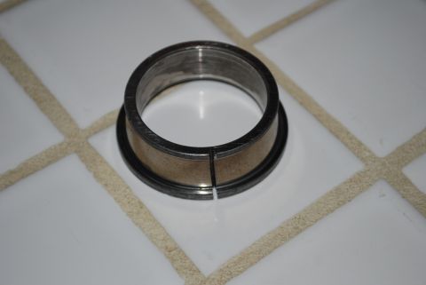 1996 Ford Bronco - A metal bearing part, likely for a vehicle, is shown on a tiled surface. The registry information may be incorrect.