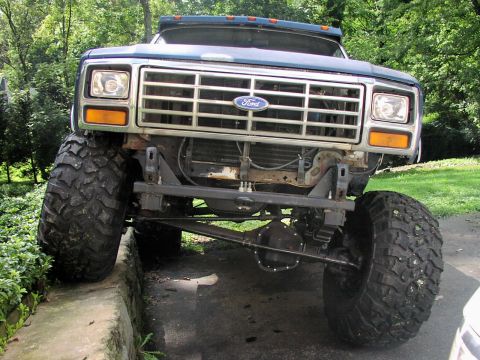 1986 Ford Bronco - This lifted 1986 Ford Bronco features aggressive off-road tires and a prominent grille.