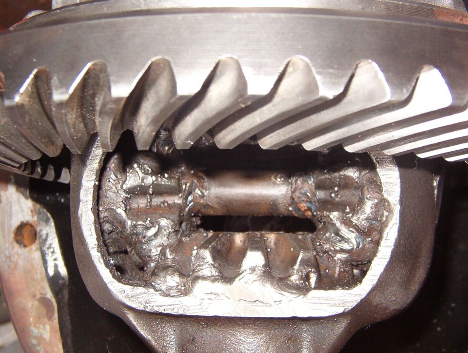 A welded differential, commonly called a "Lincoln-locker" in reference to the popular brand of welding machine.

This one has a lot of unecessary welding - the spider gears & pinion shaft could have been completely omitted since this goes in a full-floating rear axle.