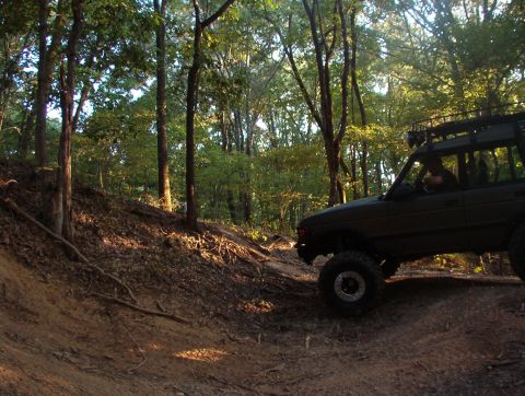 1983 Ford Bronco - Greg B then decided to attempt a hill that the 4-wheeler hadn't even done. It's between the ridge & the first hill we did today.