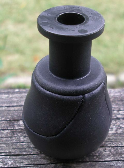 2010 Hyundai Genesis - Close-up of a black shift knob with visible stitching detail.