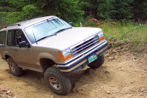 1989 Ford F-150 - Anne making easy work of East entrance of Hogs Back trail #18 with Her 6" lift and rear ARB locker.