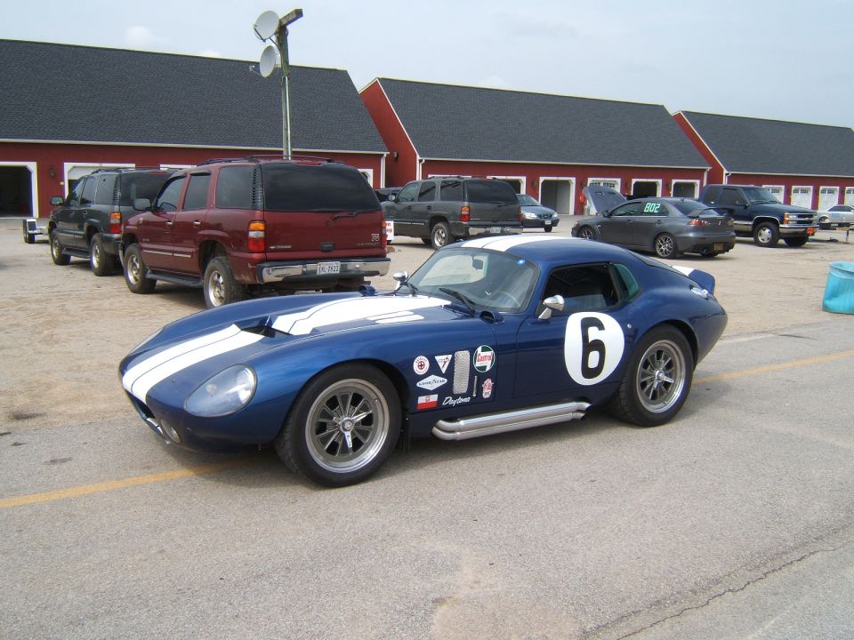 Blue Shelby Daytona Coupe replica with white stripes and number 6 roundel