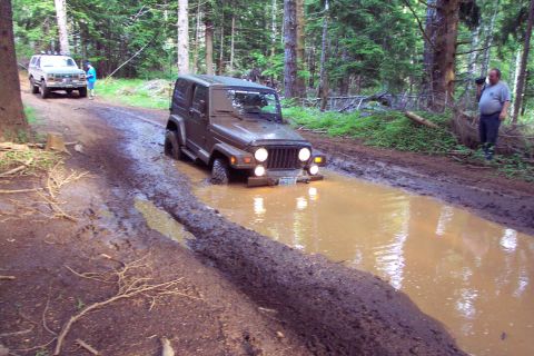 1989 Ford F-150 - Jeff finds some mud for a stuck near the West end of Firefox trail #41.
