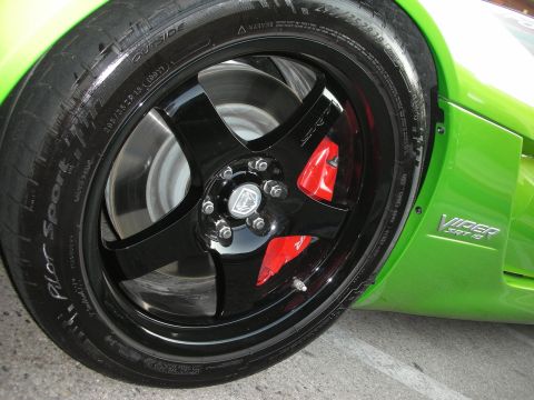 1998 Ford Crown Victoria - The Viper SRT-10 badge is visible on the bright green fender next to the black wheel.