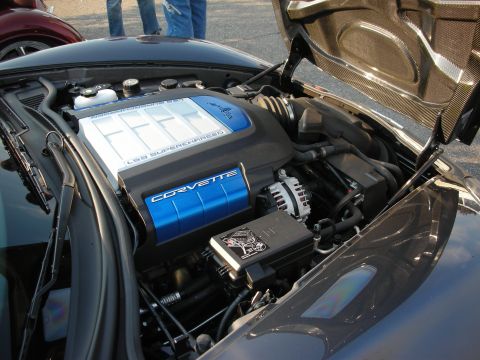 1998 Ford Crown Victoria - Close-up of a Corvette's engine compartment, highlighting the supercharged LS9 engine.