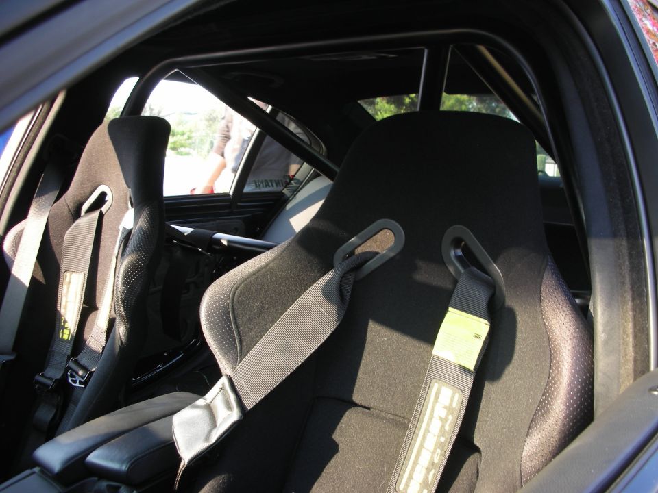 Interior view of racing seats and roll cage