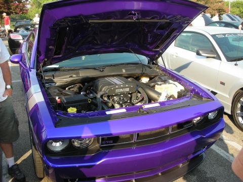 1998 Ford Crown Victoria - Purple Dodge Challenger with hood open, revealing its SMS supercharged engine.