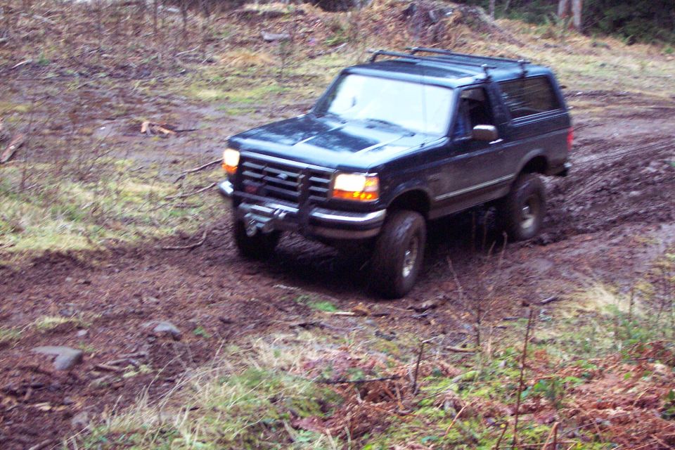 Chris in his 95 entering an unmarked trail.  About half way up this trail Chris got hung up on one 

of the stumps in the middle of the trail and got to use his winch.