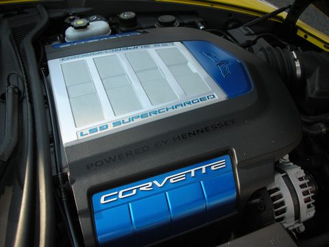 1998 Ford Crown Victoria - The engine bay displays an L99 Supercharged engine cover, branded CORVETTE and modified by Hennessey.