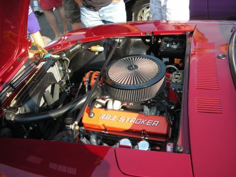 1998 Ford Crown Victoria - Close-up of a V8 engine with "383 STROKER" labeling, visible air filter, and radiator.