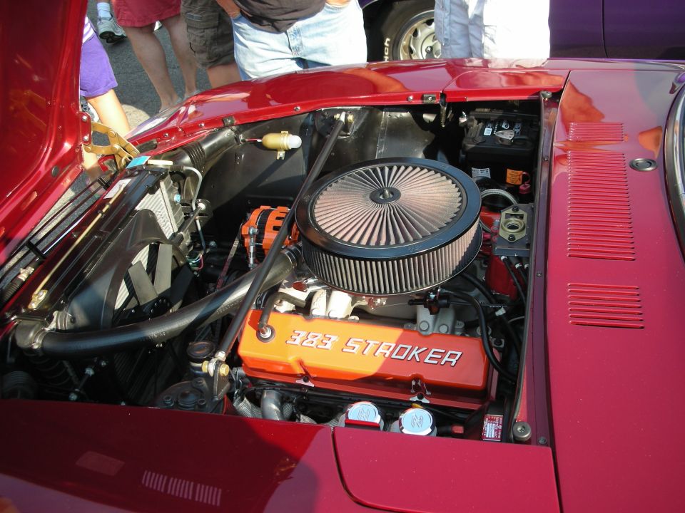 Engine bay showing a V8 engine with "383 STROKER" on the valve cover, air filter, and radiator