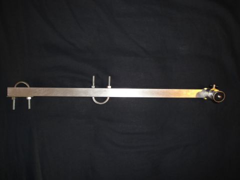 1993 Ford Taurus - A metal bracket assembly with hardware is shown against a black background.
