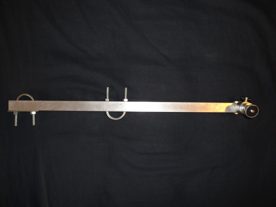 Metal bar with U-bolts and threaded bolts, and a connector on the end
