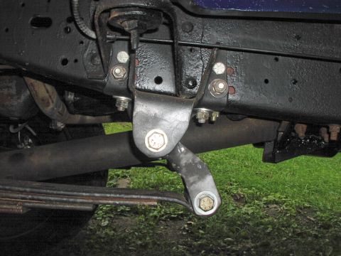 1986 Ford Bronco - Detail view of the undercarriage, focusing on suspension and leaf spring assembly.