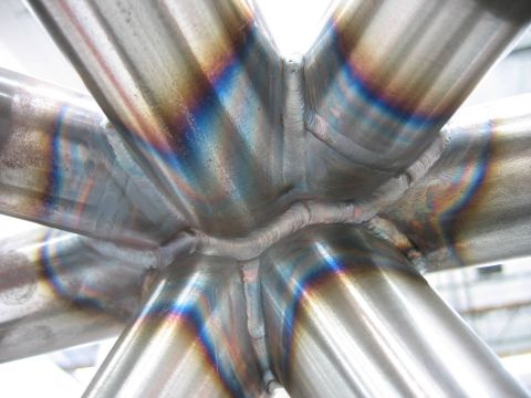 1996 Ford Bronco - Detailed view of the heat-affected zones and weld beads on a metallic framework.