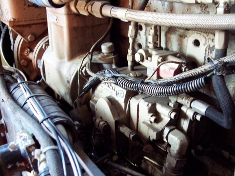 1981 Kenworth W900A - Close-up view of an engine component, showing the Cummins P2 label and various hoses and wiring.