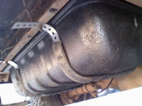 1979 Ford Bronco - Made some straps from some scrap I had and used rubber inner tube to keep metal from touching metal.