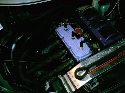 2001 Dodge 2500 - Close-up of a snowmobile engine, showing the valve cover and spark plug wires.