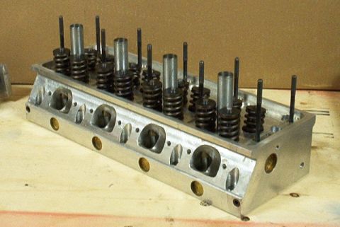 1972 Ford Ranchero - Close-up of an aluminum engine cylinder head, showing valves and springs.