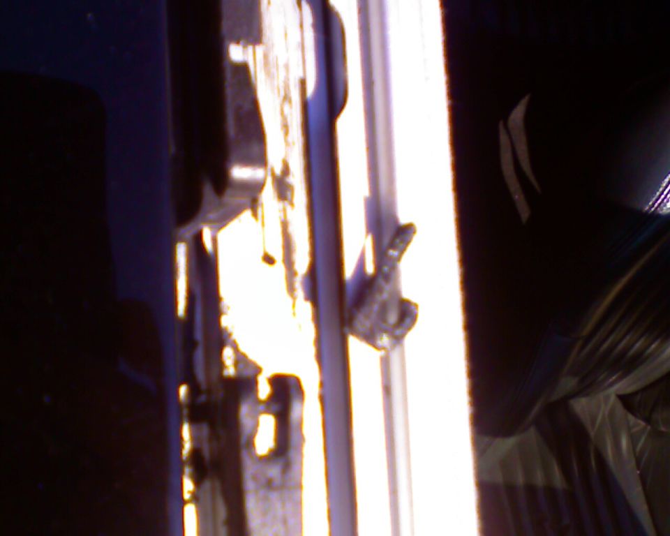 close-up of a car door latch mechanism