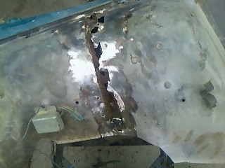 1970 Jeep Jeepster - Removed most of the body filler. Was rusted basically in half.