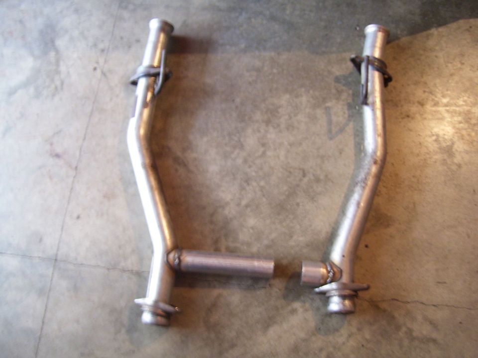 Exhaust pipes with Supermotors logo