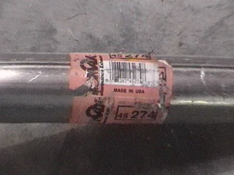 1991 Ford Bronco - A close-up view of an exhaust pipe with a K&N Performance Exhaust label and part number 45-274 is visible.