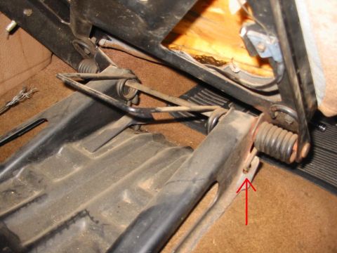 1988 Ford Bronco - This is where you pry up. First tilt seat forward. Then remove all four floor mounting bolts. Then slide seat base backwards about one foot…