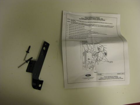 1995 Ford Bronco - Service manual page details the replacement of a right hand instrument panel tab for a 1983-84 Ford Bronco F-Series.