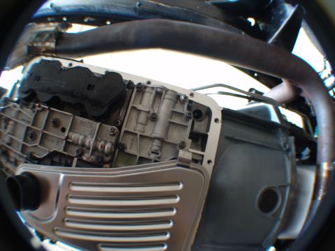 1996 Ford Bronco - Transmission pan and filter assembly, likely from a vehicle's drivetrain.