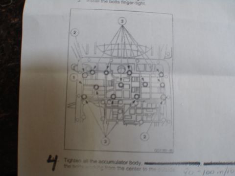 1996 Ford Bronco - This diagram illustrates the accumulator body and its bolt placement for transmission repair.