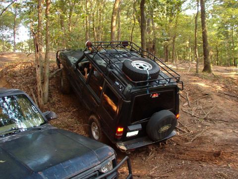 1983 Ford Bronco - This hill was a walk for Greg (both of them) when it was dry, but with damp soil, he didn't make it.