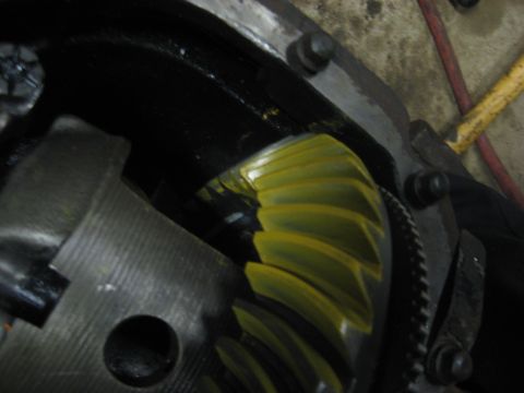 1995 Ford Bronco - A close-up view of a differential gear and its housing, showing the internal mechanics.