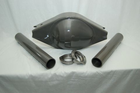 1992 Ford Mustang - A set of new rear axle components, including a differential housing and axle tubes, are displayed on a white cloth surface.