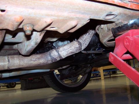 1973 Ford Ranchero - I re-used the stock steel transmission pan because I was worried about ground clearance, but there is lots of room; I installed a B&M drain…