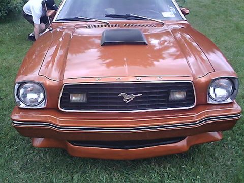 1978 Ford Mustang II - Front view of a 1978 Ford Mustang II, showing the grille and headlights.