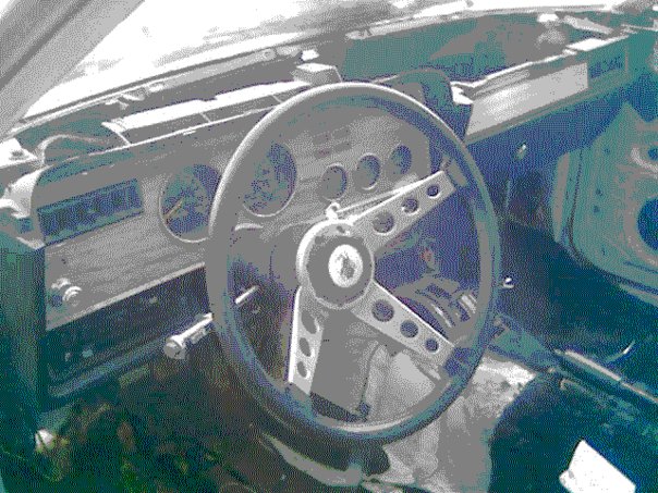 1978 Ford Mustang II interior showing dashboard, steering wheel, and gauges