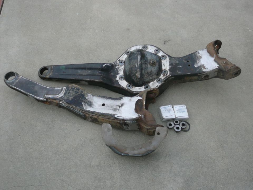 Differential axle and control arms with hardware on concrete