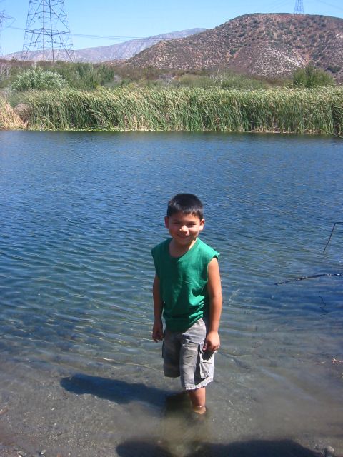 1988 Ford Bronco - My son standing in Lost Lake