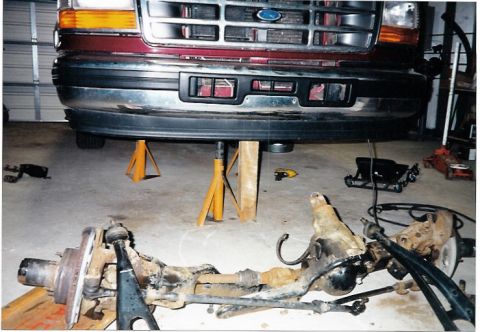 1996 Ford Bronco - Front suspension removed from a 1996 Ford Bronco for lift installation.