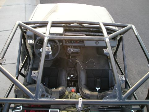 1986 Toyota Hilux - Custom roll cage installed in the interior of a 1986 Toyota Hilux.